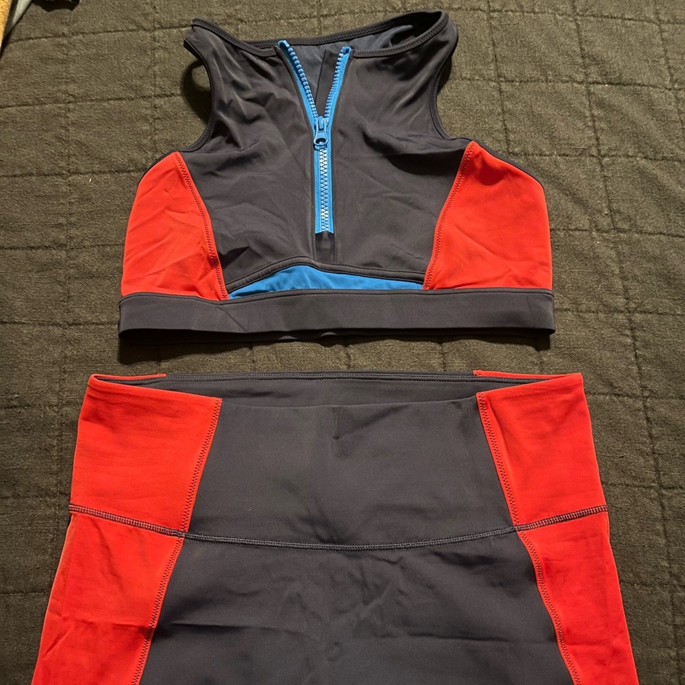 Red and Navy Athletic Swimsuit Set with Blue Accents